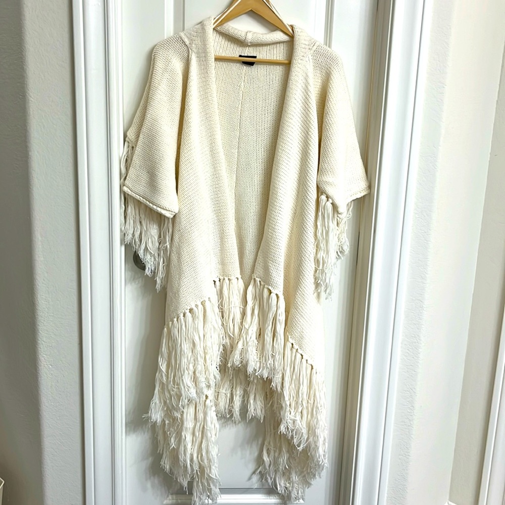 Beautiful long, beige cardigan with fringe. Size XS